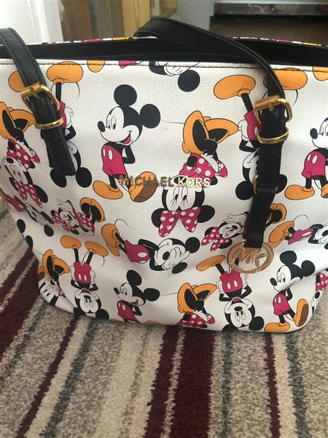 michael kors mickey mouse handtasche|Michael Kors silver satchel handbag.